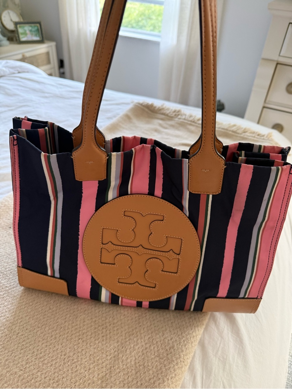 Tory Burch Ella tote featuring a vertical navy and pink canyon stripe. - Picture 2 of 8